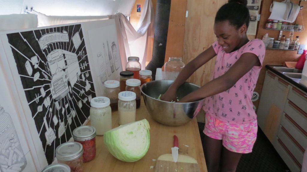 Kayla Younger learns how to make sauerkraut with special guest Fermentation on Wheels during a Youth Cook workshop