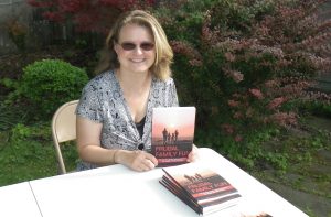 Amanda Mawhinney at a book signing for Frugal Family Fun